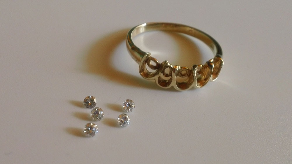 Diamonds removed to make eternity band